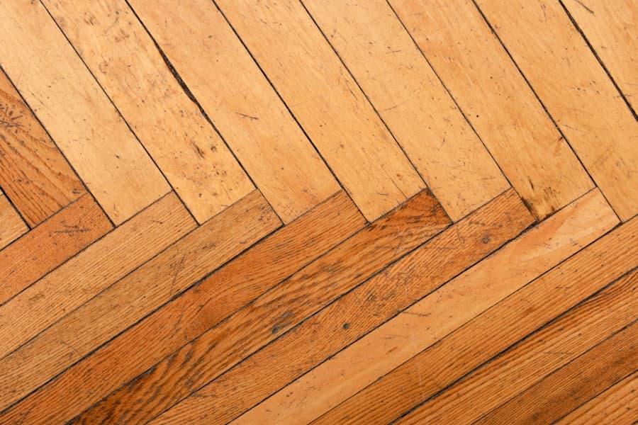 Herringbone parquet floor laid in a warm oak tone